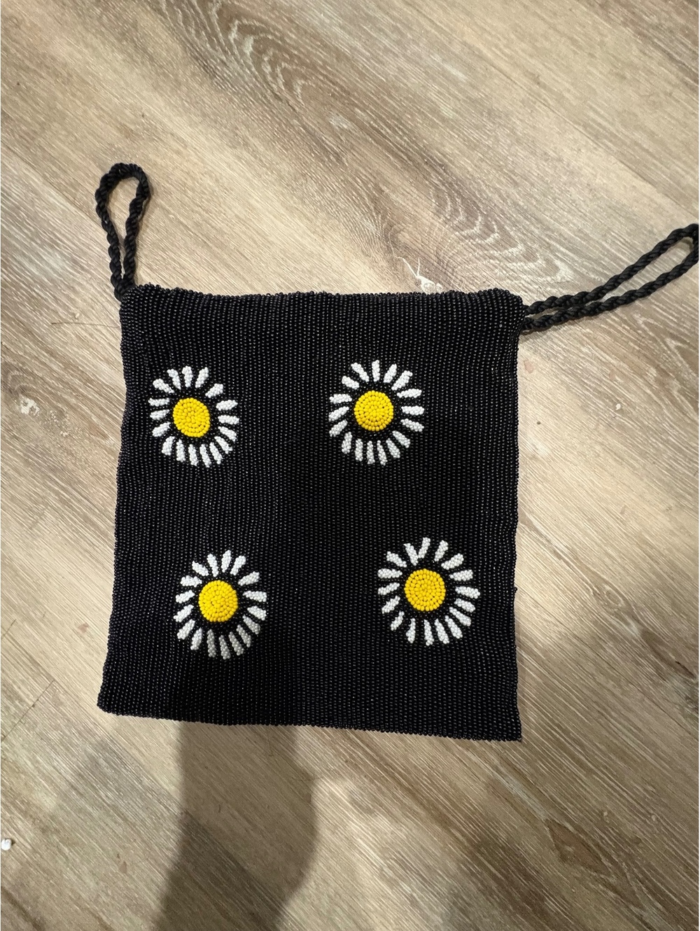 Black knit daisy shoulder bag